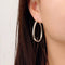 Boucles d'oreilles Jullie - Boucles d’oreilles créoles grand modèle 58 Facettes SER1010WG