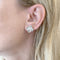 Boucles d'oreilles Van Cleef & Arpels Vintage Alhambra - Boucles d'oreilles en or blanc 58 Facettes 35689