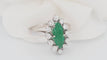 Bague 53 Bague marquise en or blanc, émeraude et diamants 58 Facettes 33052
