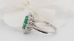 Bague 53 Bague marquise en or blanc, émeraude et diamants 58 Facettes 33052