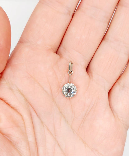 Pendentif Pendentif antique en or blanc et platine, diamant 0,95 ct 58 Facettes A07287