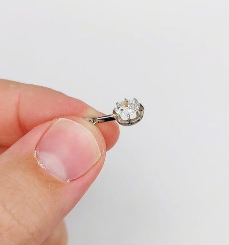 Pendentif Pendentif antique en or blanc et platine, diamant 0,95 ct 58 Facettes A07287