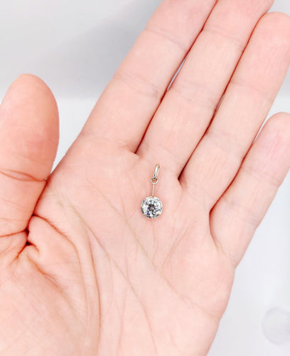 Pendentif Pendentif antique en or blanc et platine, diamant 0,95 ct 58 Facettes A07287
