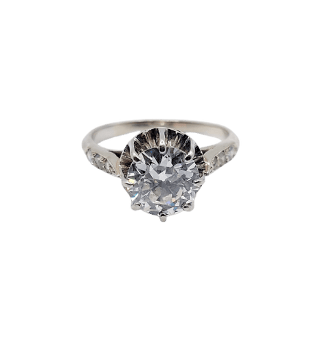 Bague 47 Bague solitaire Art déco en or blanc, platine et diamants 58 Facettes A07288