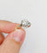 Bague 47 Bague solitaire Art déco en or blanc, platine et diamants 58 Facettes A07288