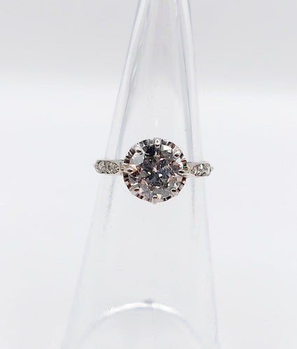Bague 47 Bague solitaire Art déco en or blanc, platine et diamants 58 Facettes A07288