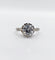 Bague 47 Bague solitaire Art déco en or blanc, platine et diamants 58 Facettes A07288
