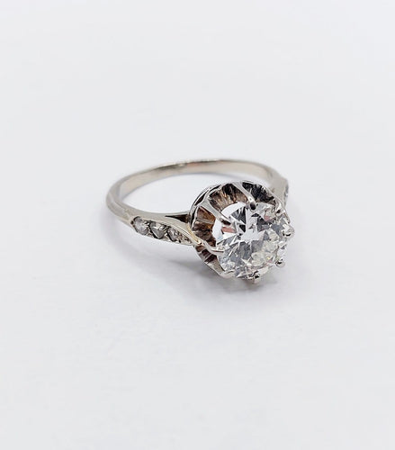 Bague 47 Bague solitaire Art déco en or blanc, platine et diamants 58 Facettes A07288