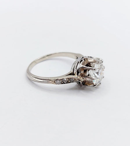 Bague 47 Bague solitaire Art déco en or blanc, platine et diamants 58 Facettes A07288