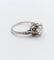 Bague 47 Bague solitaire Art déco en or blanc, platine et diamants 58 Facettes A07288