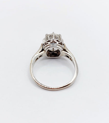 Bague 47 Bague solitaire Art déco en or blanc, platine et diamants 58 Facettes A07288