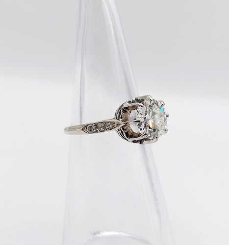 Bague 47 Bague solitaire Art déco en or blanc, platine et diamants 58 Facettes A07288