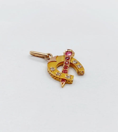 Pendentif Pendentif fer à cheval en or 18k, diamants et pierres rouges 58 Facettes A07268