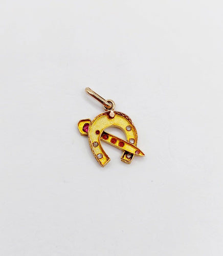 Pendentif Pendentif fer à cheval en or 18k, diamants et pierres rouges 58 Facettes A07268