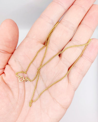 Collier Collier maille gourmette 40,5 cm en or jaune 18K 58 Facettes A07126