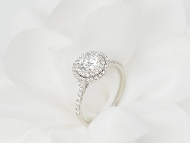 Bague 53 Bague solitaire en or blanc 18 kt et diamants 58 Facettes 31788/32448