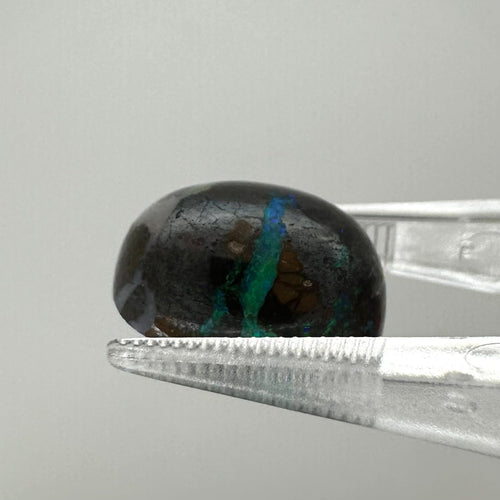 Opale boulder australienne - Pierre ovale cabochon 7,48 ct 58 Facettes