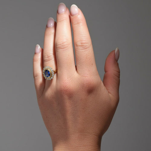 https://cdn.shopify.com/s/files/1/1015/8633/8124/files/vintage-daisy-ring-sapphire-diamonds-gold-18k-1.jpg?v=1779629411