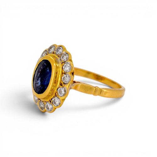 https://cdn.shopify.com/s/files/1/1015/8633/8124/files/vintage-daisy-ring-sapphire-diamonds-gold-18k-4.jpg?v=1779629451