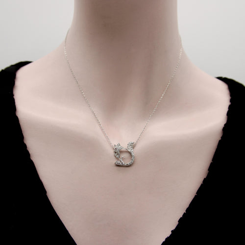 Pendentif Rétro - Pendentif écureuil en platine, or blanc, diamants et rubis 58 Facettes A2009E