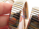 Montre Bulgari Tubogas - Montre triple tour en or jaune 18K et acier 58 Facettes 275115