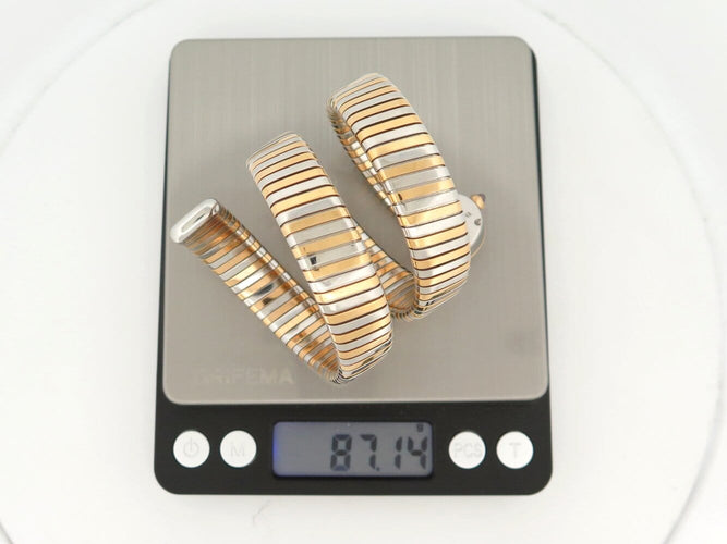 Montre Bulgari Tubogas - Montre triple tour en or jaune 18K et acier 58 Facettes 275115