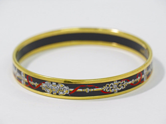 Bracelet Hermès - Bracelet en métal plaqué or et émail 58 Facettes g0dpkzh892