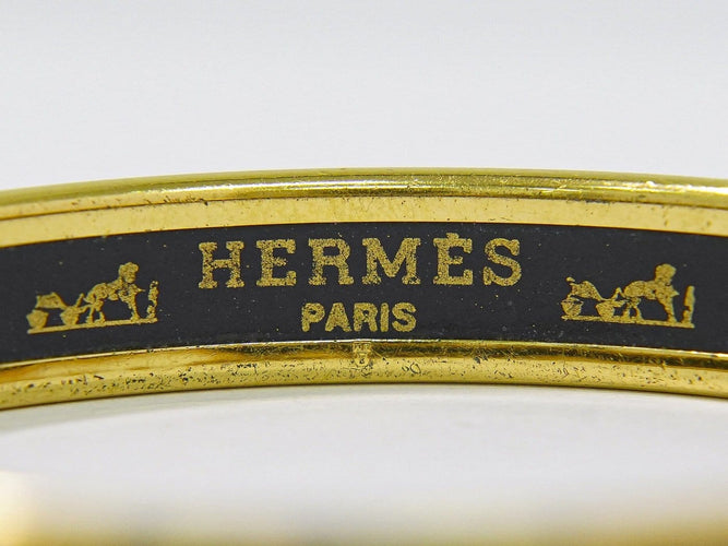 Bracelet Hermès - Bracelet en métal plaqué or et émail 58 Facettes g0dpkzh892