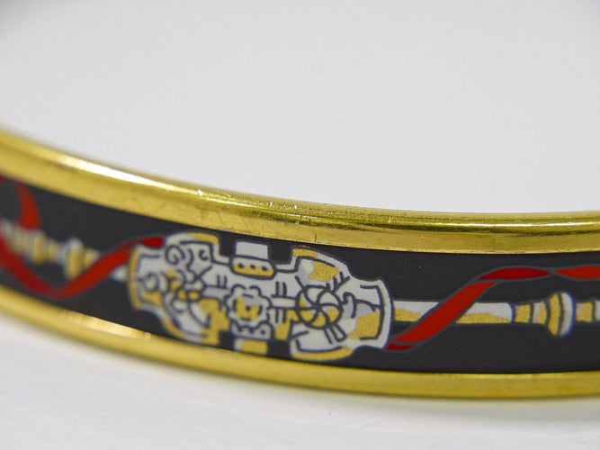 Bracelet Hermès - Bracelet en métal plaqué or et émail 58 Facettes g0dpkzh892