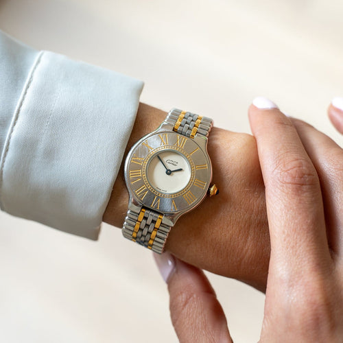 Montre Cartier Must 21 - Montre LM en acier et or, cadran ivoire 58 Facettes 536