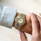 Montre Cartier Must 21 - Montre LM en acier et or, cadran ivoire 58 Facettes 536