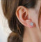 Boucles d'oreilles Van Cleef & Arpels Sweet Alhambra - Boucle d’oreille en or blanc et diamants 58 Facettes jnci61