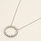 https://cdn.shopify.com/s/files/1/0735/5324/8552/files/tiffany_wg_nckl_circle_dmnds_0036.jpg?v=1780609079