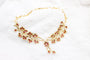 Parure florale en or jaune, rubis et diamants 58 Facettes 240164