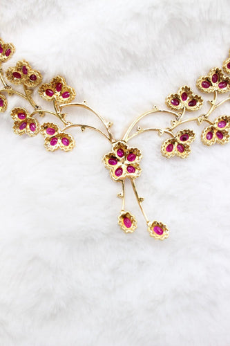 Parure florale en or jaune, rubis et diamants 58 Facettes 240164