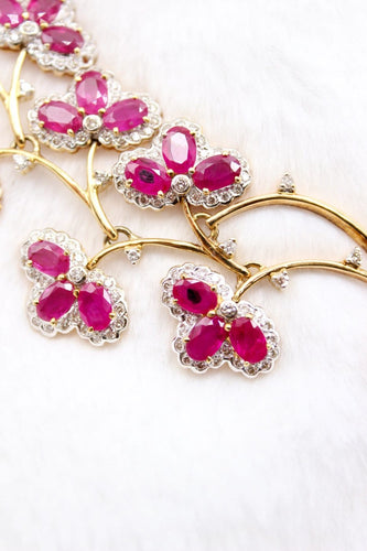 Parure florale en or jaune, rubis et diamants 58 Facettes 240164