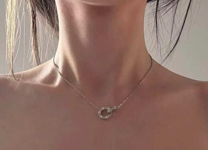 Pendentif Cartier Love - Pendentif en or gris et diamants 58 Facettes jnci68