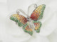Broche Broche papillon en or blanc 18k, citrine, topaze, péridot et diamants 58 Facettes 33134