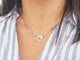Collier Dinh Van - Collier Menottes R12 en or blanc et diamants 58 Facettes 33175
