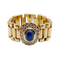 Bague souple en or 18k avec saphir cabochon et diamants