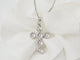 Collier Collier croix en or blanc et diamants 58 Facettes 21080