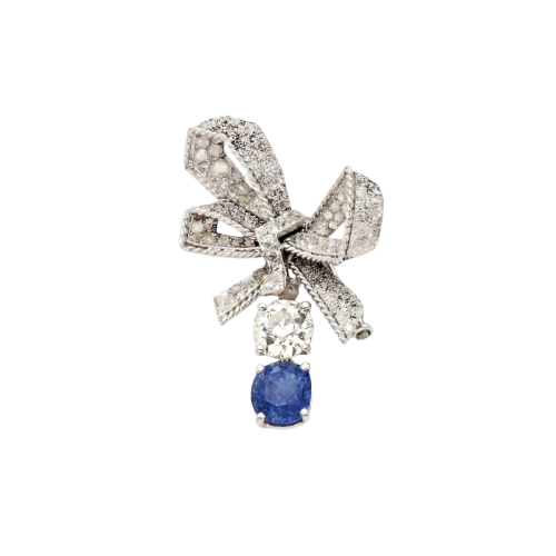 Broche nœud en platine et or blanc, saphir de Ceylan et diamants