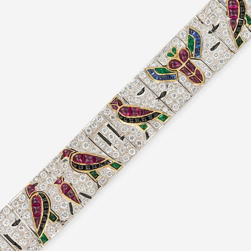 egyptian-revival-bracelet-with-rubies-emeralds-sapphires-onyx-and-diamonds-close-up-scaled-1400x1400.jpg