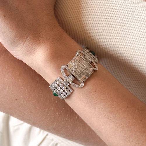 art-deco-platinum-diamond-and-emerald-ribbon-bracelet-on-hand-2-1400x1400.jpg