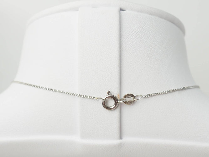 Collier Collier solitaire en or blanc 18 kt avec saphir ovale 58 Facettes 19367