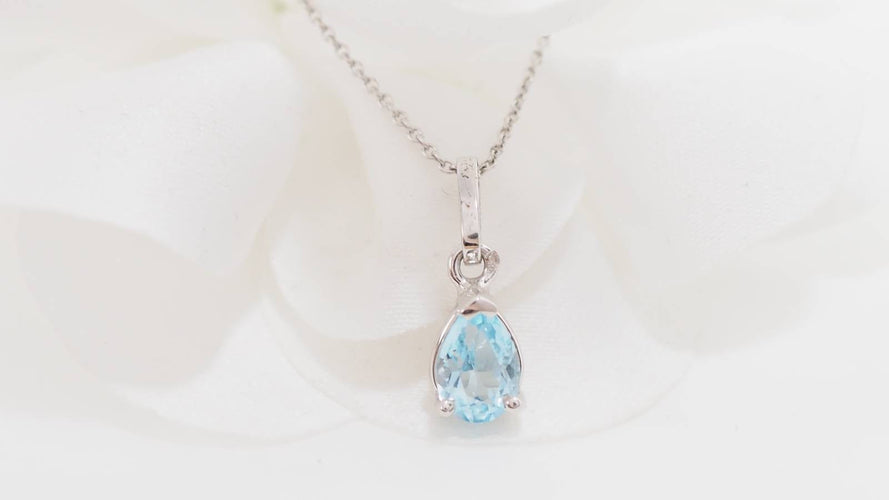 Collier Collier solitaire en or blanc et topaze bleue 58 Facettes CLAL
