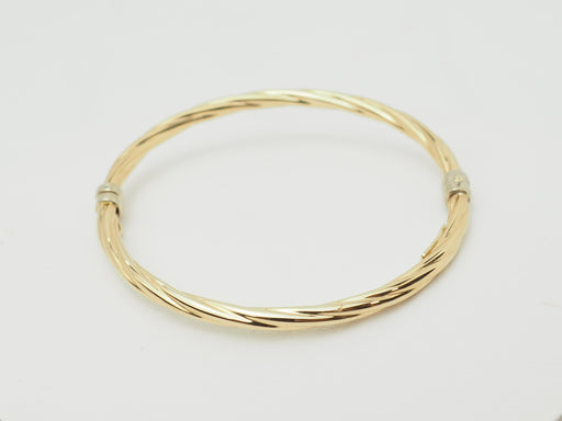 Bracelet Bracelet enfant ouvrant jonc torsadé en or jaune 58 Facettes 33634