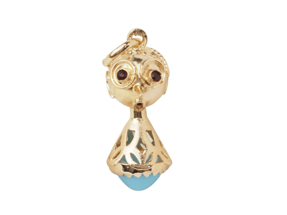 Pendentif Pendentif breloque figurine en or jaune, turquoise et grenats 58 Facettes 33336