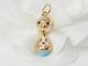 Pendentif Pendentif breloque figurine en or jaune, turquoise et grenats 58 Facettes 33336