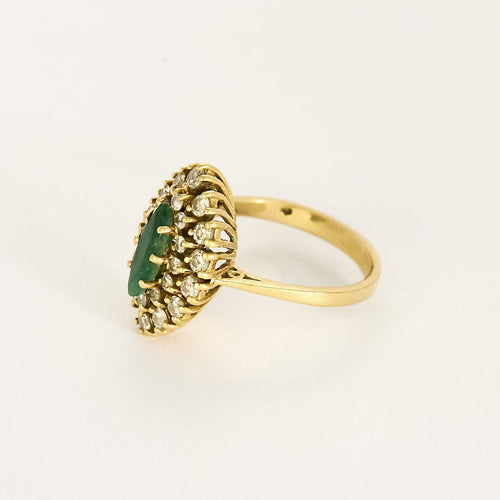 Bague 55 Bague navette en or jaune, émeraude et diamants 58 Facettes B260165